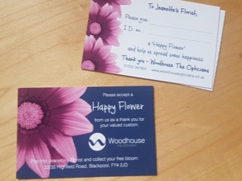 woodhouse opticians - happy flower voucher